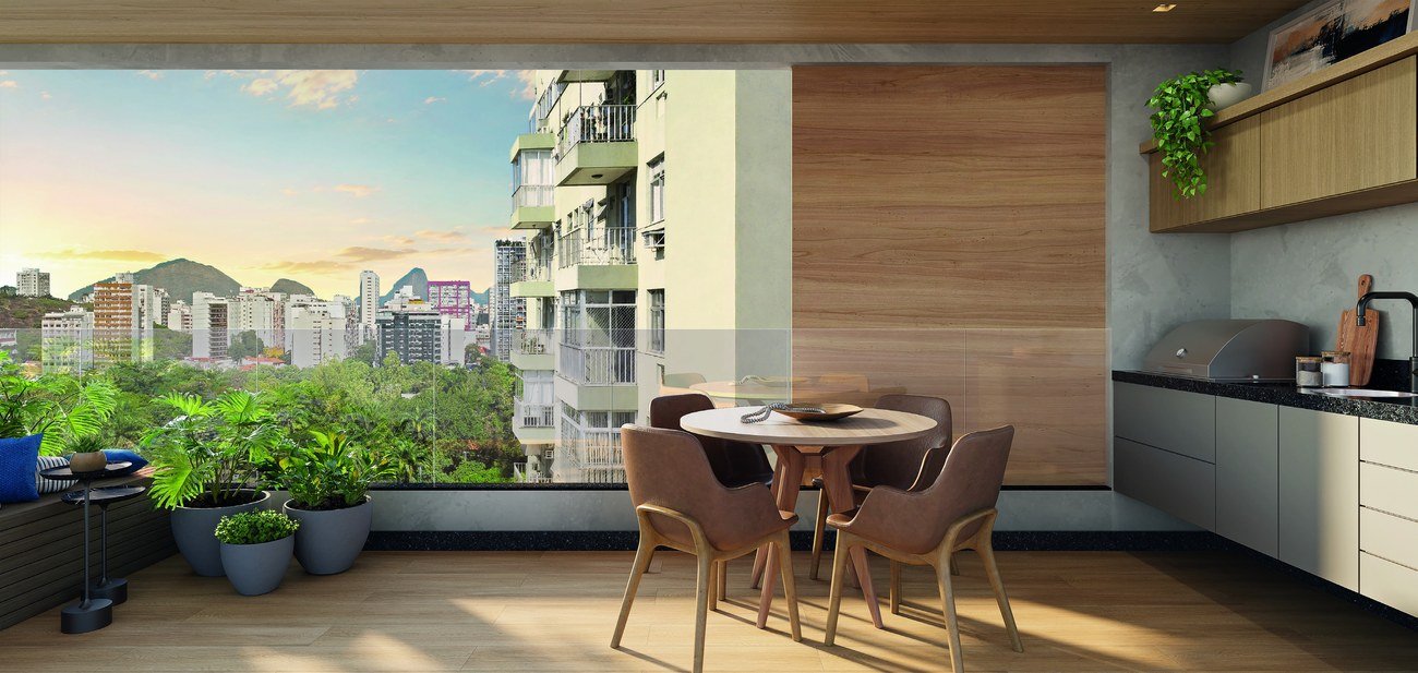 Perspectiva da varanda gourmet de um apartamento do Baume Icaraí, com churrasqueira